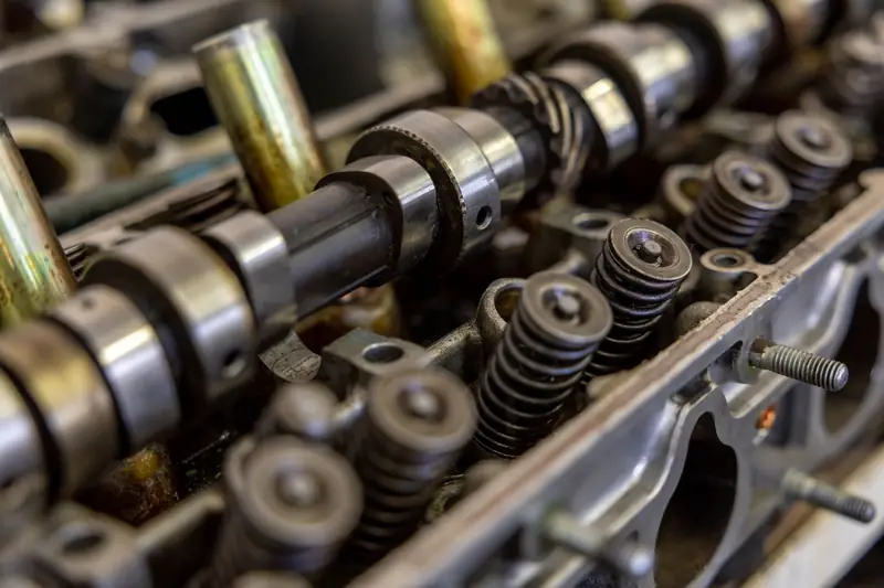 Camshaft and valve springs inside an engine